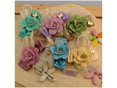 Rose Satinate Bomboniere Capodimonte con saponette colorate