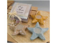 Bomboniera Tema Mare Candela Stella marina Gialla Azzurra e sabbia