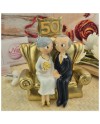 Sposini Torta 50 anni matrimonio seduti sul divano-Nara Bomboniere